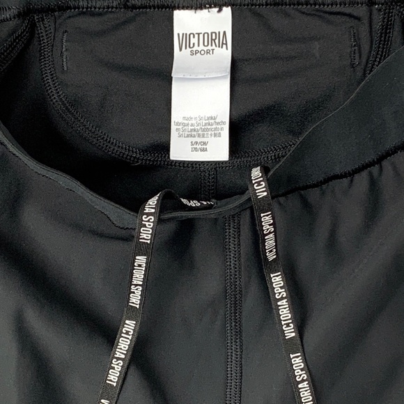 Victoria Sport Vented Leg Zip Ankle Reflective Strip Leggings - Picture 7 of 7